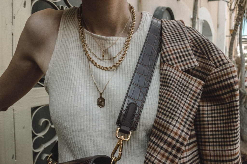 golden necklaces layering